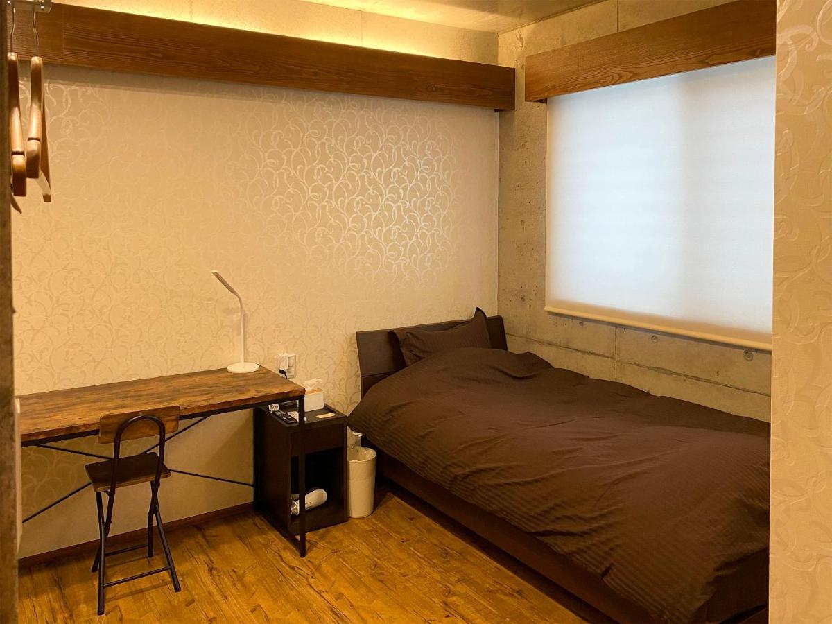 Hotel Kugani-Ya. à Kin Extérieur photo